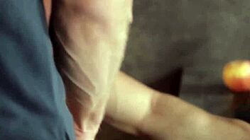 Muscular gay hunks get close while banging and stroking