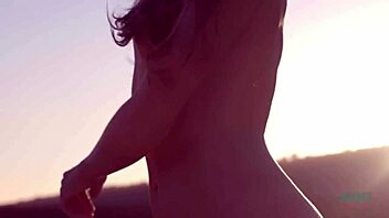 Petite and beautiful Talia Mint pleasures herself on the public beach