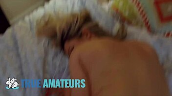 big tit blonde gives footjob and sucks cock