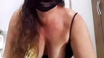 Naughty slut undresses for anal toy play