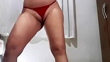 Naughty slut undresses for anal toy play