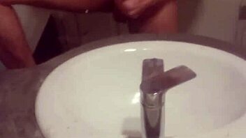 the young guy masturbates in his room