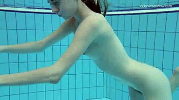 teen 18+ anna netrebko in striped swimsuit underwater