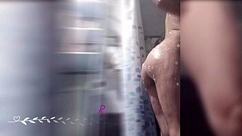 Massaging my hairy cock in the shower leads to massive toy insertion