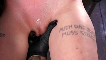 Small tits slave in bondage getting whipped on the butt