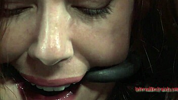 clamped playgirl endures anal hook with toy torment