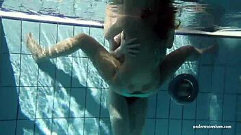 Russian teen babes Zuzana and Lucie enjoy poolside lesbian fun