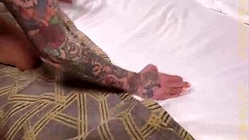 pornslap features tattooed milf sarah jessie loving warm sperm on phone