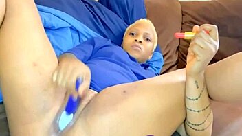 She's doing solo masturbation with big tits