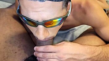 TWINK SUCKS BIG BLACK COCK FROM SECURITY GUARD