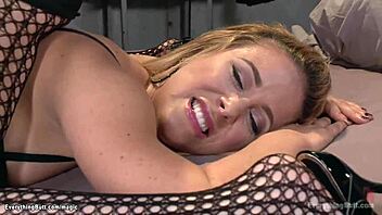 A BDSM session featuring a blonde with a big tits and a huge strapon for assplay