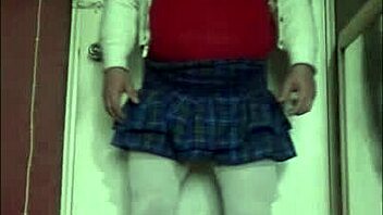 Crossdressing beauty swallows her partner's load in gay sex video