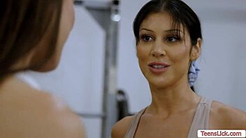 Lesbian trainer works her student’s wet pussy hard