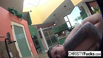 hot christy mack masturbates on the kitchen counter, playing with her big tits and wet pussy