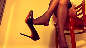 Paulette Lerouge Dangles High Heels In Stockings