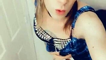 gorgeous tranny in lingerie sucks and touches her hard clitty.