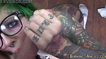 Tattooed slut sucks cock in POV