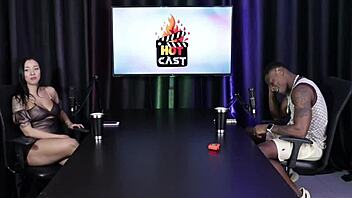 Measuring the hot brunette's ass in sheer red lingerie