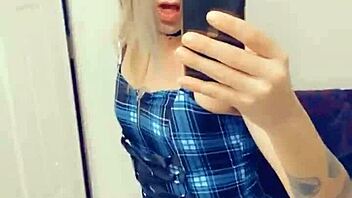 gorgeous tranny in lingerie sucks and touches her hard clitty.