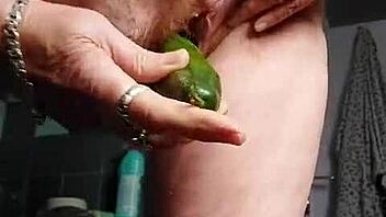 german granny whore fucks hairy cunt with cucumber in solo play