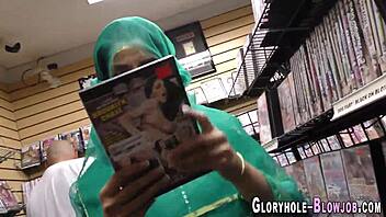 Cocksucking whore gets cumshot at gloryhole