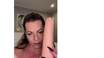 Seductive MILF with a muscular twist in solo pleasure performance