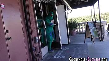 Cocksucking whore gets cumshot at gloryhole