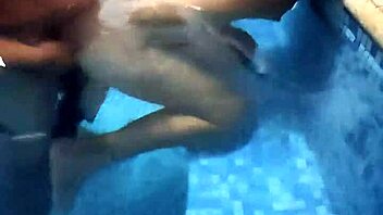Latina prostitute fucks mature man at pool recording.