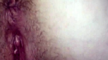 Intense pussy play bent over, leading to cum.