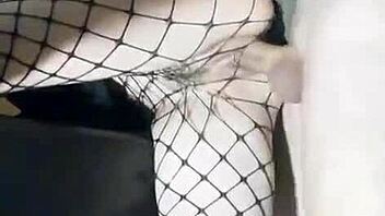 Slender girlfriend in skirt and stockings stands for homemade fucking