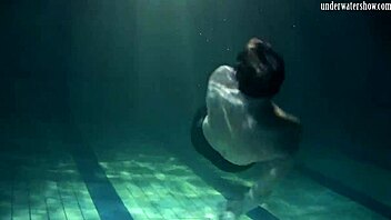 yo, check lozhkova rocking see-through shorts while swimming in the pool!