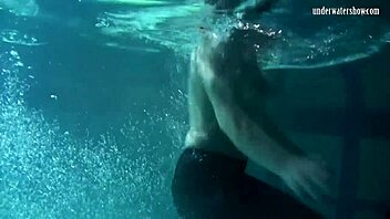 yo, check lozhkova rocking see-through shorts while swimming in the pool!