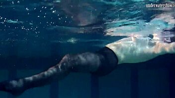 Lozhkova's seductive poolside solo show in transparent shorts
