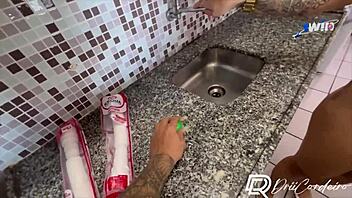 Plumber Helps Neighbor In Kitchen With Big Surprise