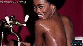 Alicia, the ebony teen model, showcases her voluptuous figure and ample derriere in a playful solo session for Playboy.