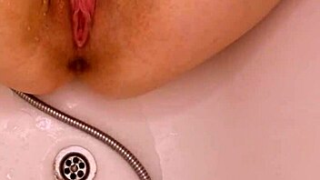 Hey, watch me stroke my tight pussy in the bathtub until I burst!