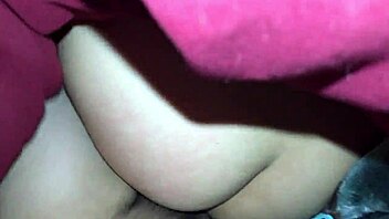 The wife lies sideways and takes a hot creampie from her husband