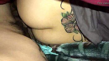 The wife lies sideways and takes a hot creampie from her husband