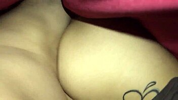 The wife lies sideways and takes a hot creampie from her husband