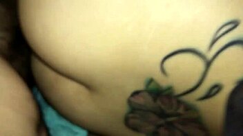 The wife lies sideways and takes a hot creampie from her husband