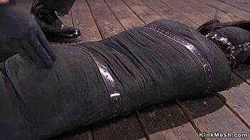 Mummified brunette gets whipped hard