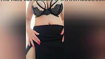 Busty woman in black skirt and seductive bra performs a tantalizing dance - luxuryorgasm