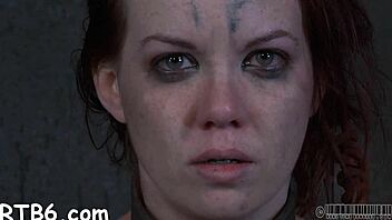 Painful clamping applied to beauty's milk sacks