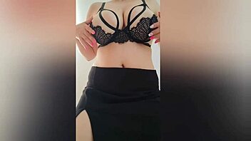 Busty Beauty Dances Wild in Black Skirt and Sexy Bra - LuxuryOrgasm