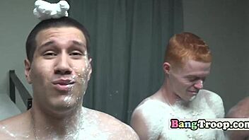 muscled soldiers groping in steamy shower orgy.