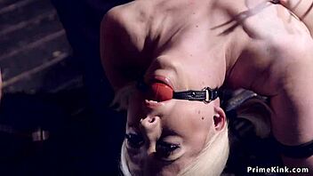 Blonde endures device bondage zipper treatment