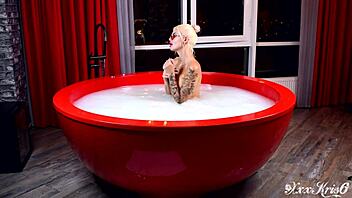 tattooed bitch swallows cum and swaps it with her man?