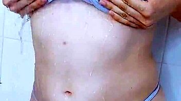 Step sister bathing in the shower, looking wet and sexy.