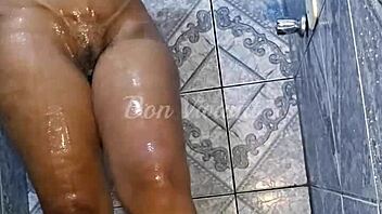 Big-ass Brazilian prostitute caught bathing on hidden camera
