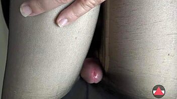 Close up POV footjob and cumshot in pantyhose